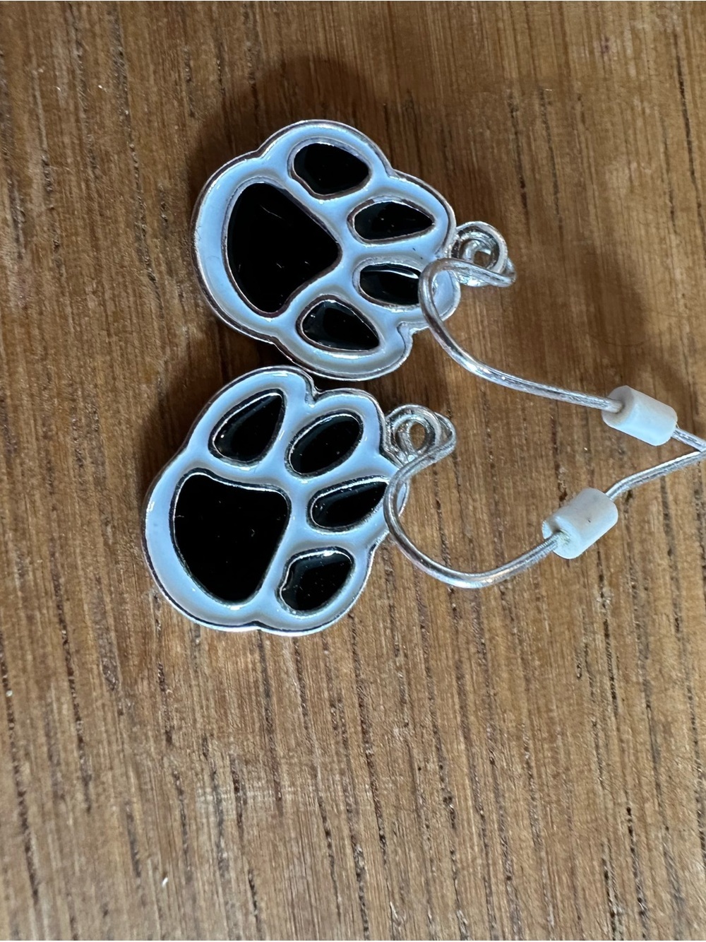 Paw Print Dangle Earrings in Black and Silver